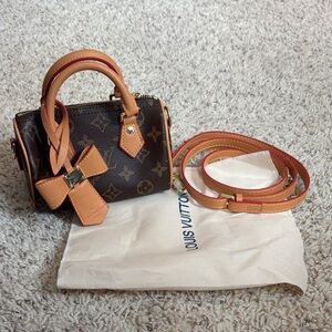 Louis Vuitton Monogram Mini Bag with Tan and Red Trim